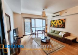 fully furnished 1br unit with balcony and parking for lease in one serendra