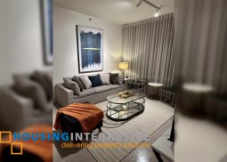 fully furnished 2br unit with balcony and parking for lease in proscenium at rockwell