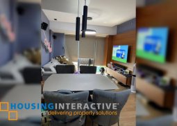 semi-furnished 2br unit with balcony for sale in the rise