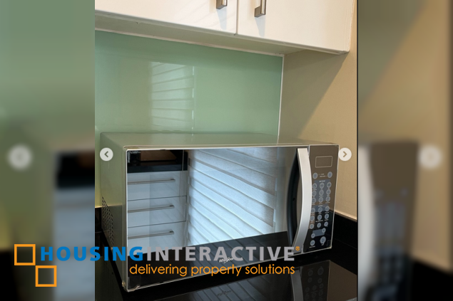 fully furnished 2br unit with parking for rent in one serendra