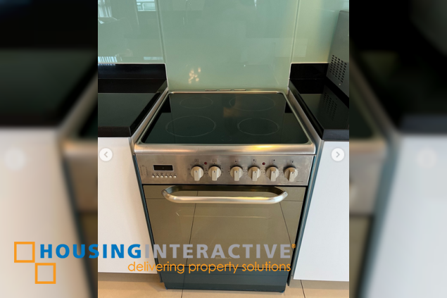 fully furnished 2br unit with parking for rent in one serendra