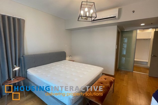 fully furnished 2br unit with balcony for lease in one serendra