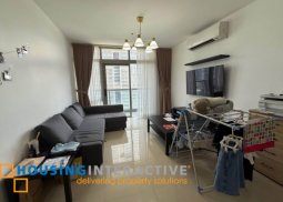 semi-furnished 2br unit with balcony and parking for sale in east gallery place