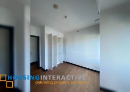 bare 2br unit with parking for sale in the residences at greenbelt