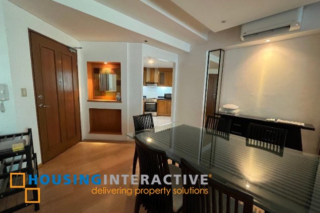 fully furnished 2br unit with parking for sale in bonifacio ridge