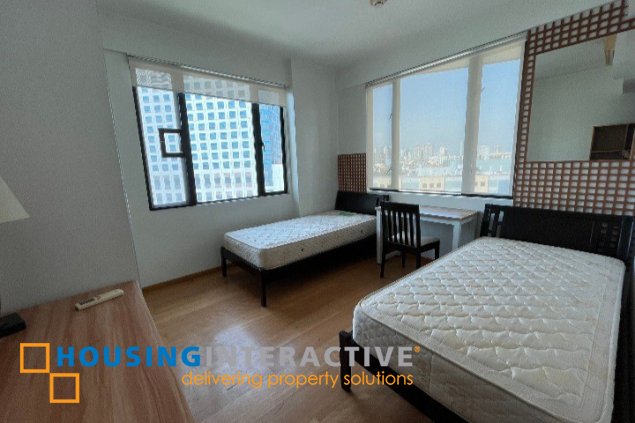 fully furnished 2br unit with parking for sale in bonifacio ridge