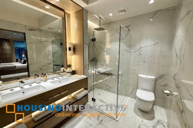 semi-furnished brandnew 3br unit with parking for sale in aurelia residences