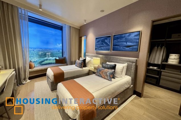 semi-furnished brandnew 3br unit with parking for sale in aurelia residences