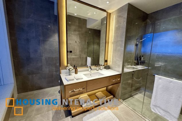 semi-furnished brandnew 3br unit with parking for sale in aurelia residences