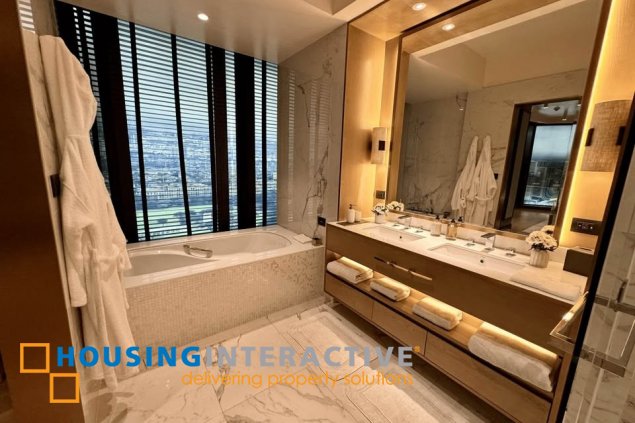 semi-furnished brandnew 3br unit with parking for sale in aurelia residences