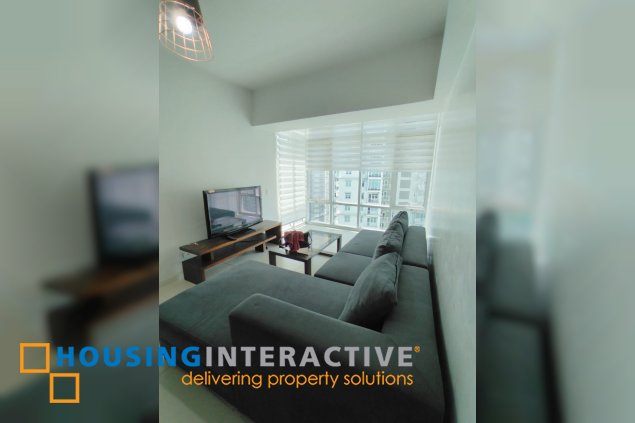 semi-furnished 3br 3br unit with parking for lease in two serendra