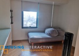 a luxurious 2-bedroom apartment in the heart of rockwell, makati