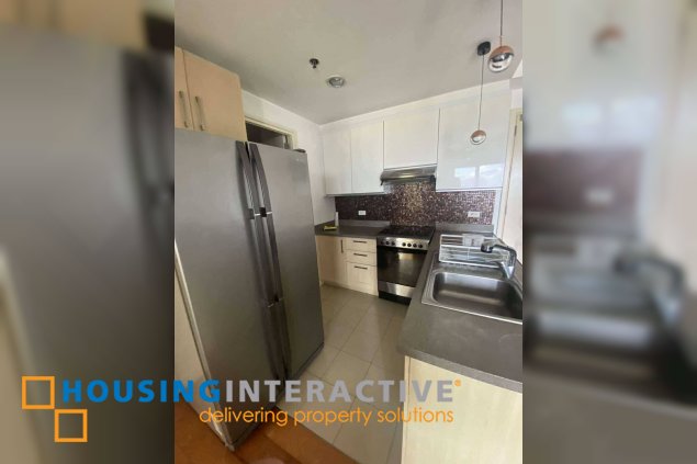 a luxurious 2-bedroom apartment in the heart of rockwell, makati city