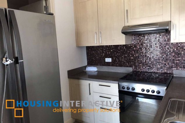 a luxurious 2-bedroom apartment in the heart of rockwell, makati city