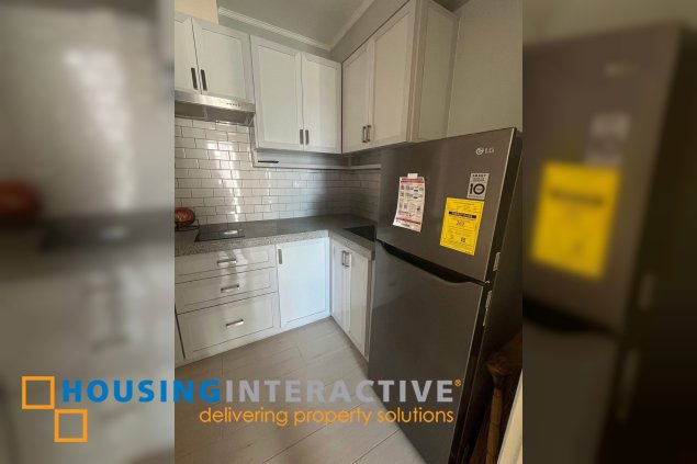 semi-furnished 2br unit for sale in acqua private residences