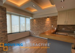 semi-furnished 2br loft type unit with parking for lease in one rockwell