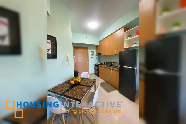 fully furnished 1br unit with balcony for rent in trion towers