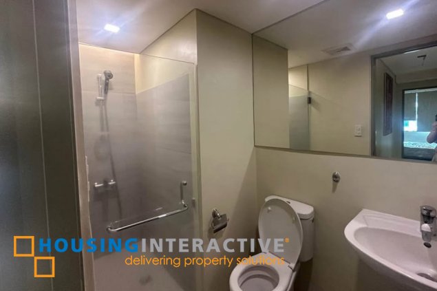 semi-furnished 3br unit with parking for lease in bonifacio ridge