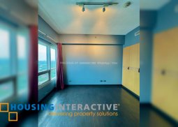 bare 2br unti with parking for sale in the residences at greenbelt