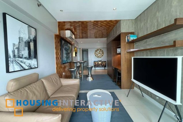 fully furnished 1br unit with balcony and parking for sale in two serendra