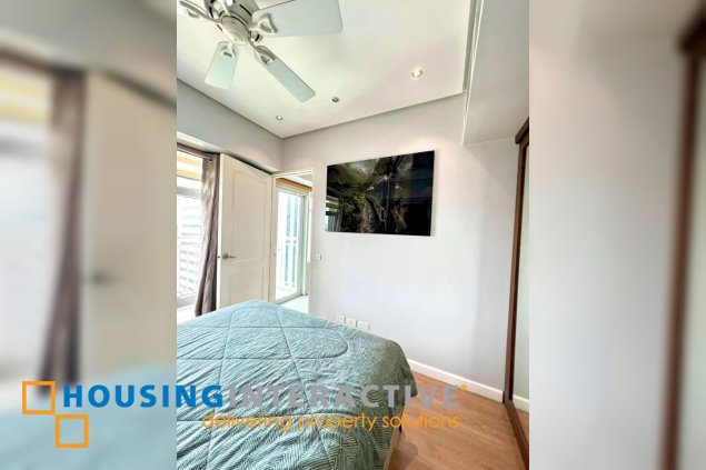 fully furnished 1br unit with balcony and parking for sale in two serendra