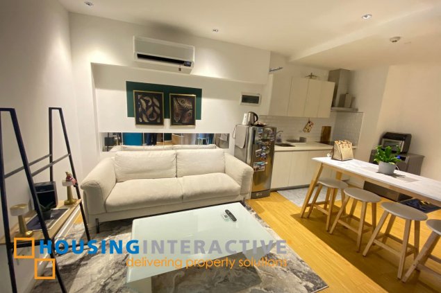 fully furnished 2br unit with balcony for sale in acqua private residences
