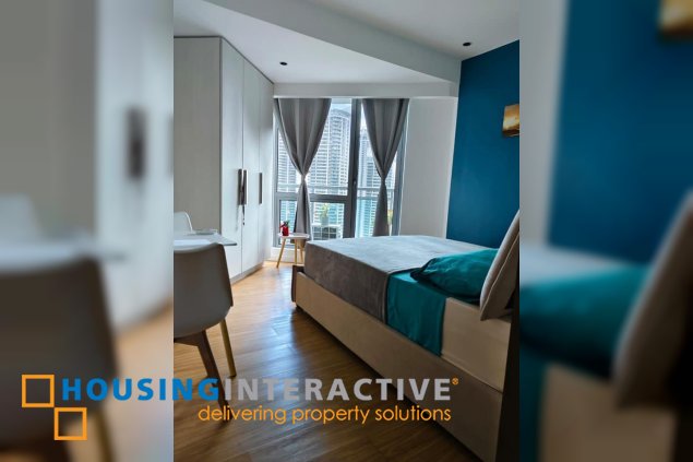 fully furnished 2br unit with balcony for sale in acqua private residences