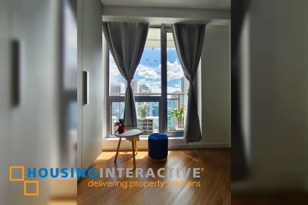 fully furnished 2br unit with balcony for sale in acqua private residences
