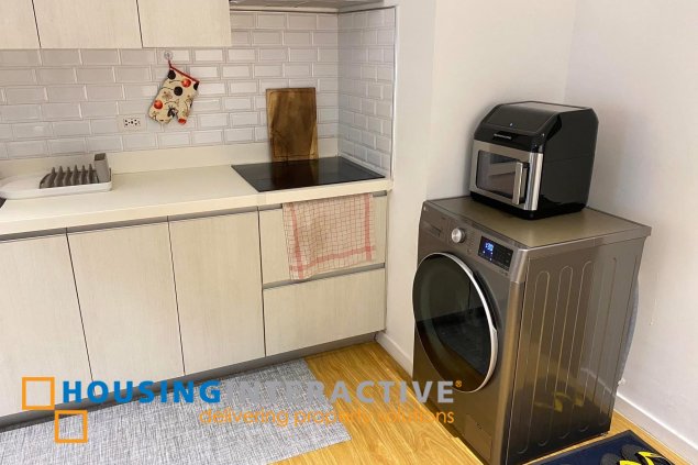 fully furnished 2br unit with balcony for sale in acqua private residences