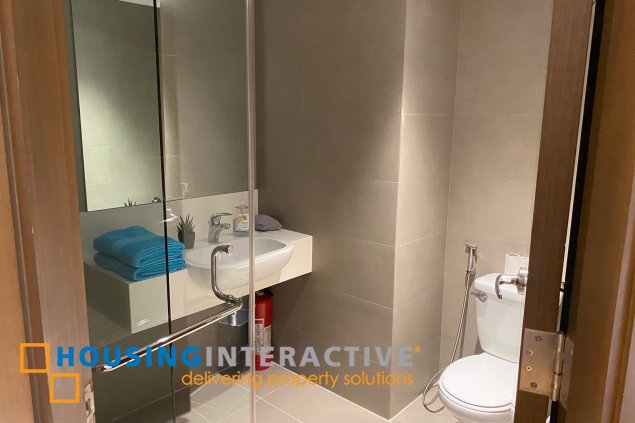 fully furnished 2br unit with balcony for sale in acqua private residences