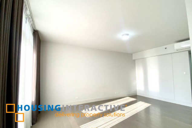 semi-furnished 2br unit with parking for lease in proscenium at rockwell