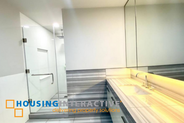 semi-furnished 2br unit with parking for lease in proscenium at rockwell