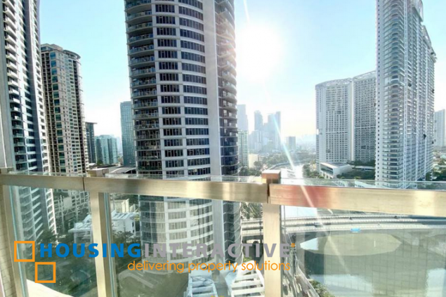 semi-furnished 2br unit with parking for lease in proscenium at rockwell