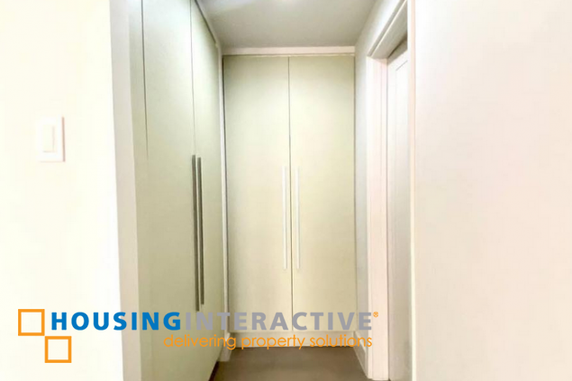 semi-furnished 2br unit with parking for lease in proscenium at rockwell