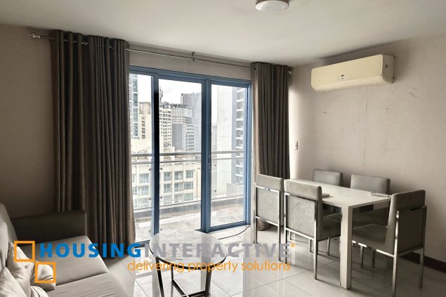 furnished 1br unit with parking for sale in two central