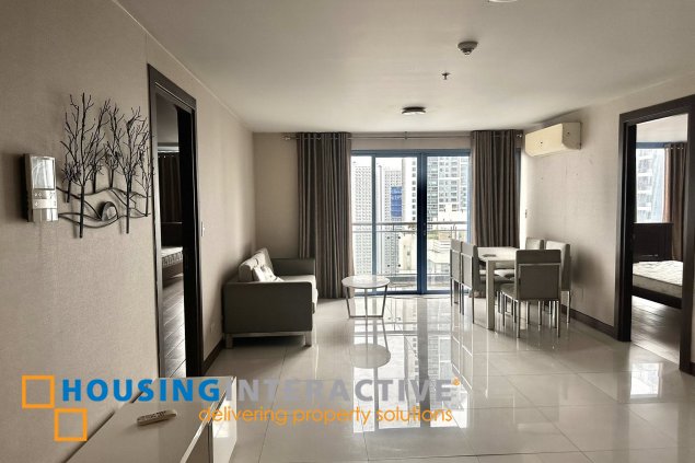 furnished 1br unit with parking for sale in two central