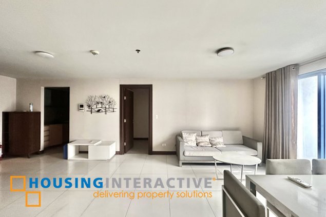 furnished 1br unit with parking for sale in two central