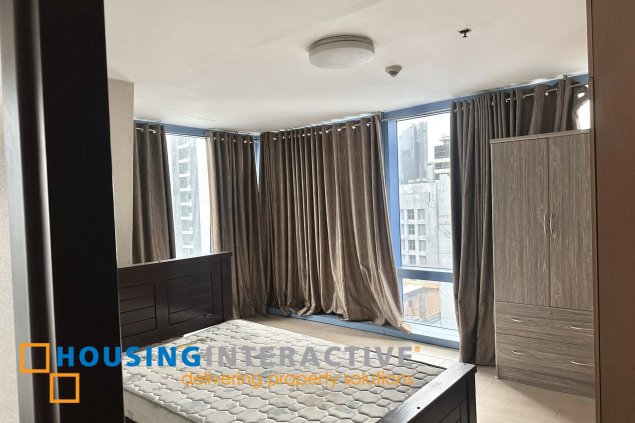 furnished 1br unit with parking for sale in two central