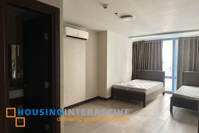 furnished 1br unit with parking for sale in two central