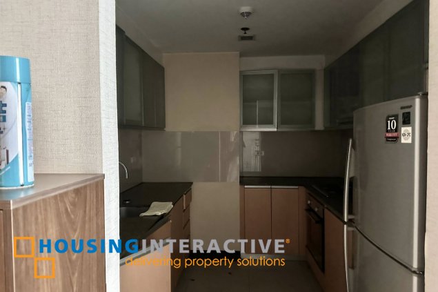 furnished 1br unit with parking for sale in two central