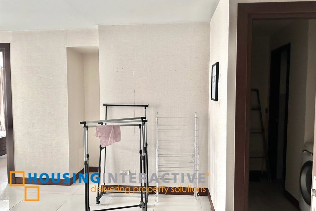 furnished 1br unit with parking for sale in two central