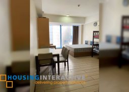 furnished studio unit with parking for sale in three central