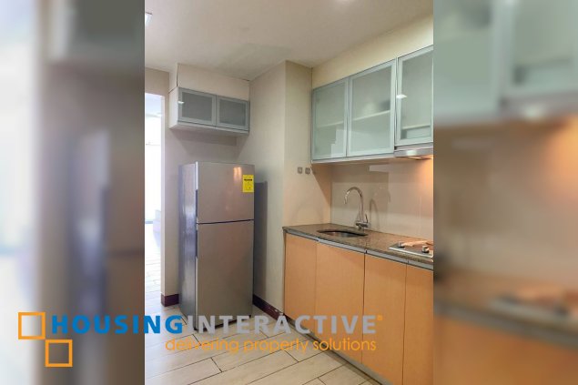 furnished studio unit with parking for sale in three central