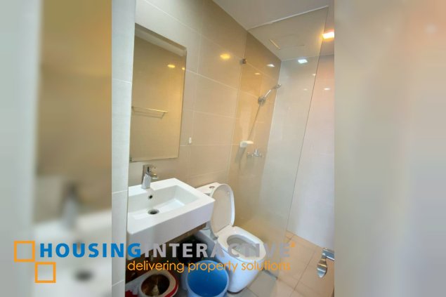 furnished studio unit with parking for sale in three central