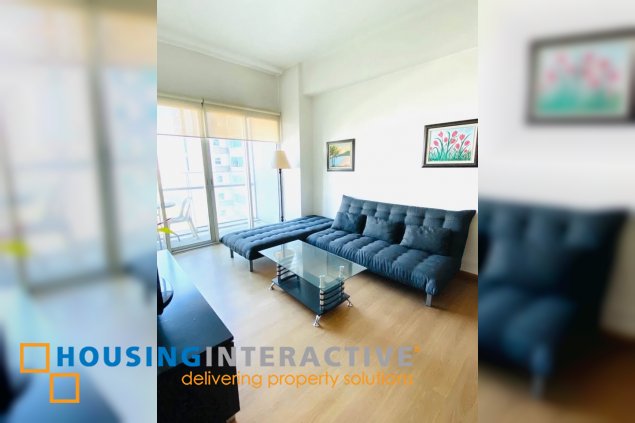 nicely furnished 1br unit with balcony for sale in st. francis shangri-la place