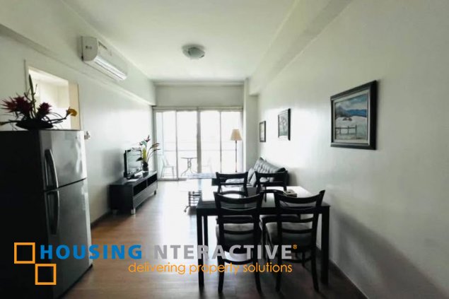 nicely furnished 1br unit with balcony for sale in st. francis shangri-la place