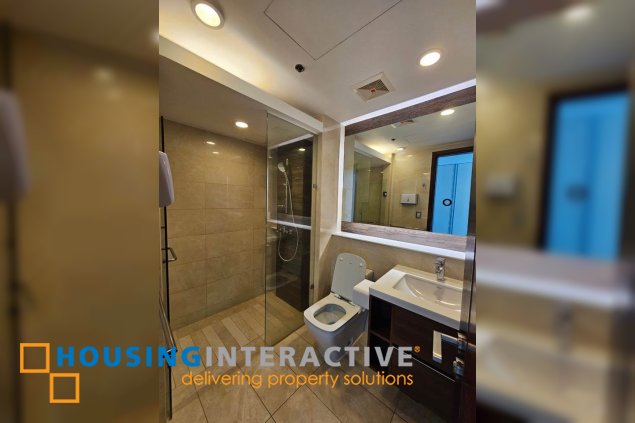 bare 3br unit with parking for sale in two roxas triangle