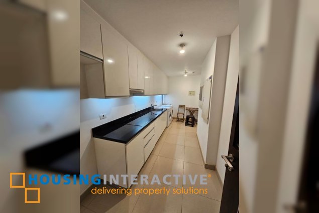 bare 3br unit with parking for sale in two roxas triangle