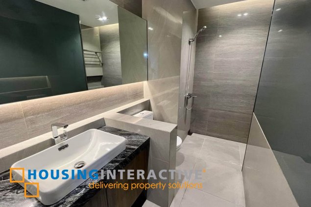 semi-furnished 2br unit with parking for sale in arya residences