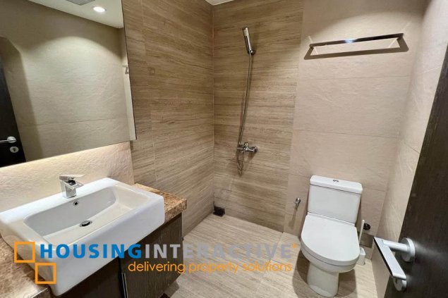 semi-furnished 2br unit with parking for sale in arya residences